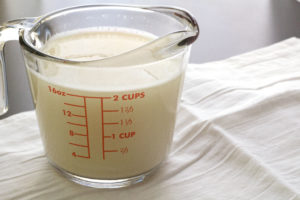 yeast mixture in measuring cup