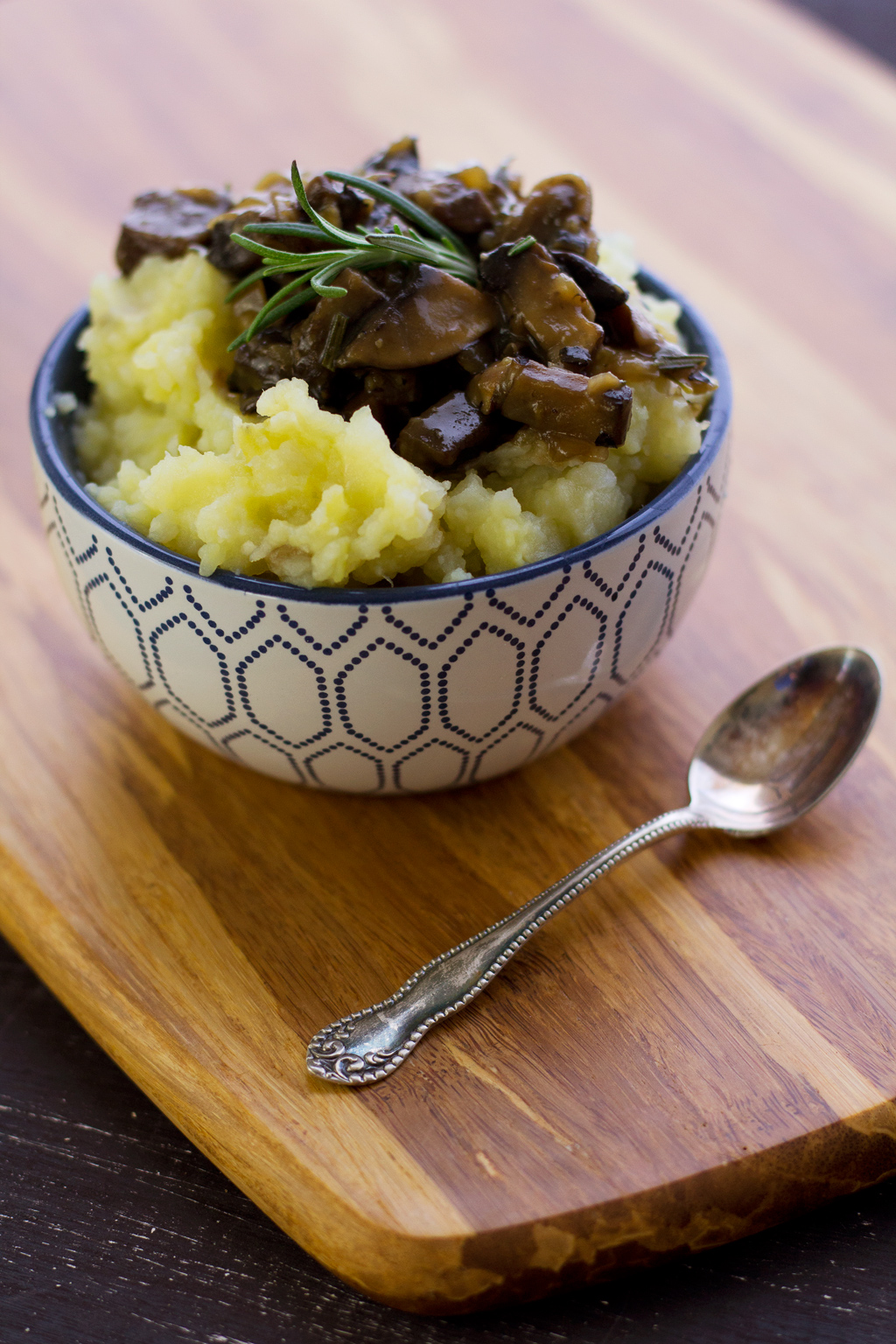closeup of cauliflower mashed potatoes with vegan mushroom gravy recipe