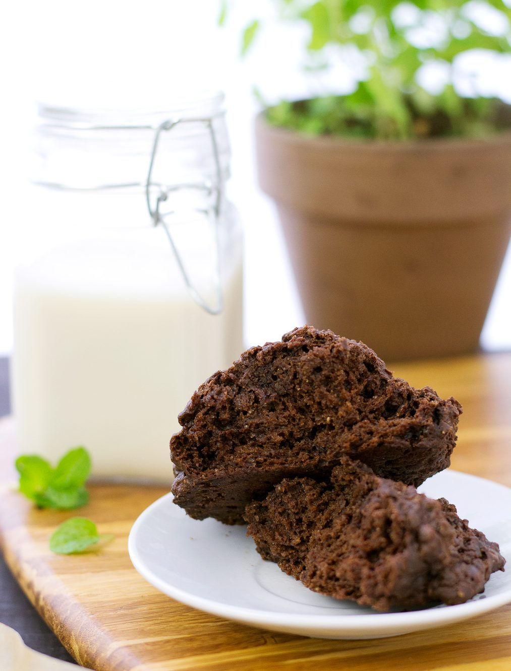 Easy vegan chocolate mint scone broken open to show a delicious and moist inside!