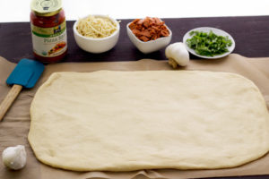 shaped dough for vegan pizza rolls