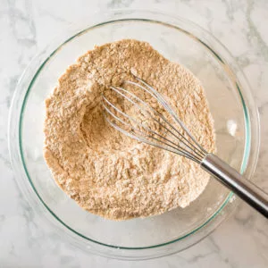 easiest vegan corn dog recipe: whisking the dry ingredients together